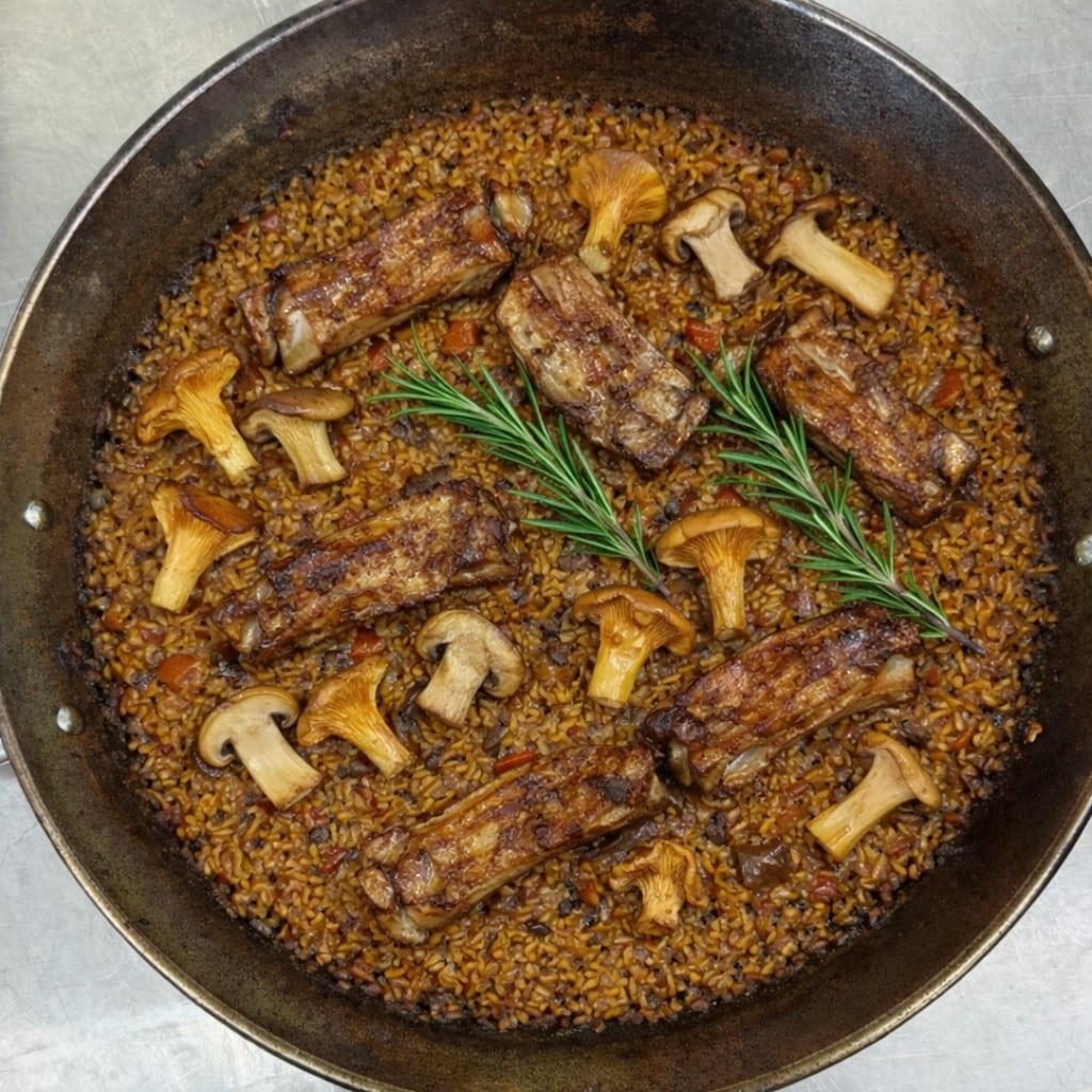 Paella de costella i bolets