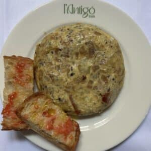 Truita de patates amb tòfona, melosa per dins.